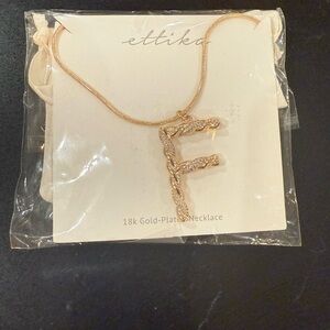 ettika Gold Initial Necklace with Sparkling Pendant “F”